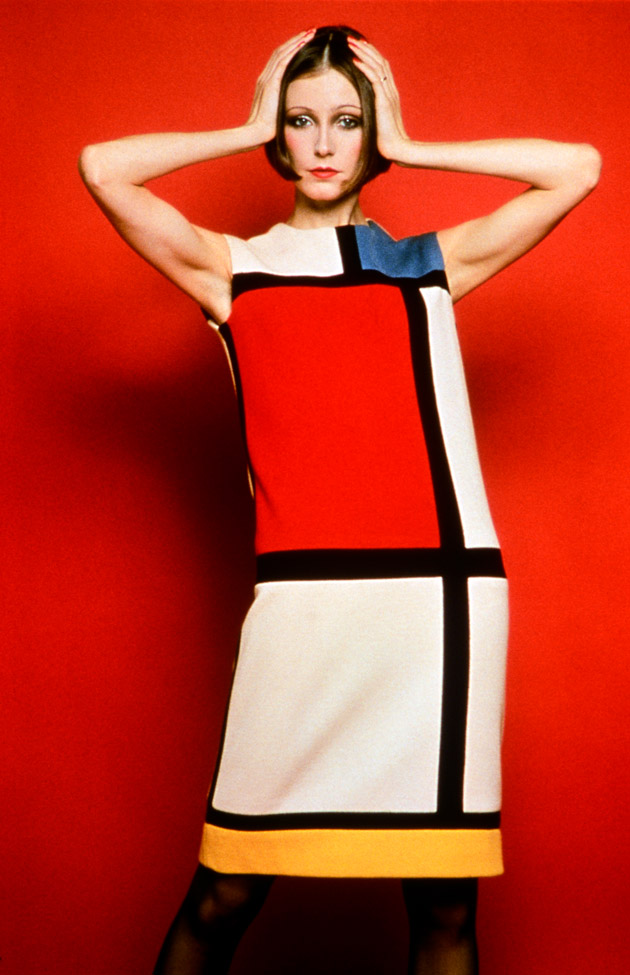 Model posing in Yves Saint Laurent's Mondrian Dress