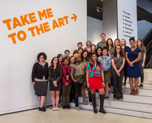 Photo of the Equity Team standing under a sign that says Take Me to the Art